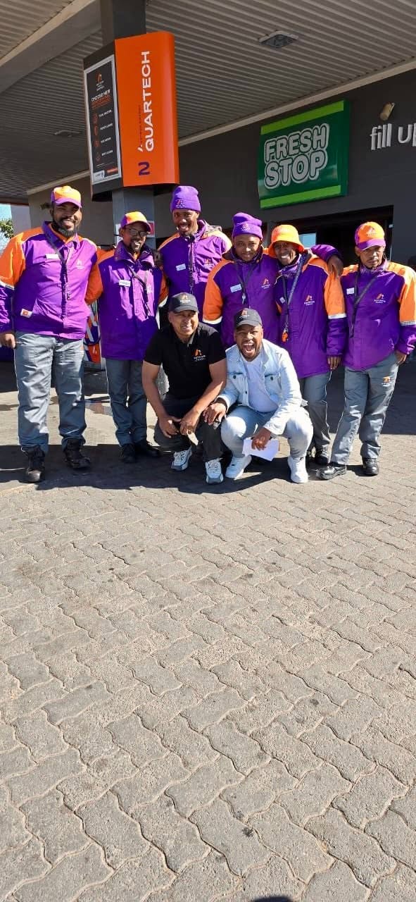 Mafa with team in purple and orange