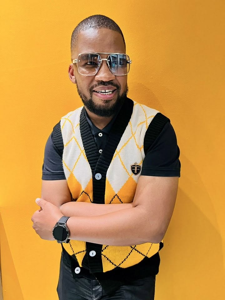 Mafa portrait against yellow wall